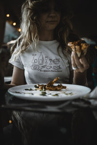 Woman eating Italian Pizza