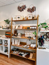 small store with handmade products organized throughout wall displays