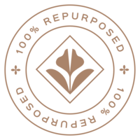 Emblem that says "100% repurposed" with a flower icon in the middle, representing the brand of Perennial Content.