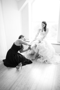 Austin Family Photographer, Tiffany Chapman Photography bride getting shoes on photo