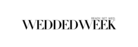 Logo with script words "Saks Fifth Aveneue"