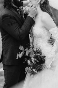 close up black and white image of  bride an d groom