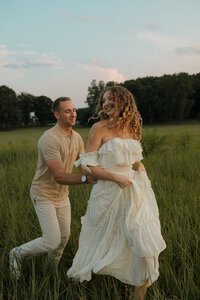 golden hour engagement photoshoot in a field