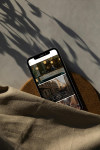 Luxury hotel website mockup for The Emerson Boutique Hotel, featuring a high-end, user-friendly design for an immersive guest experience