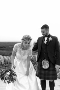 bride and groom embracing