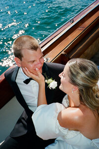 Bride and groom  popping champagne at their Queenstown elopement