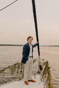 Groom attire for their sunset sailboat elopement in Gulf Shores Alabama