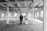 bride and groom in a warehouse at Company 251