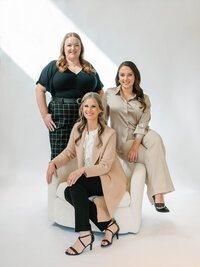 The Nouvelle Weddings team captured in a professional group photo, featured as part of their luxury brand identity by Sarah Shuttle