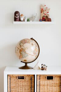 globe on shelf to show copywriting saas lifestyle