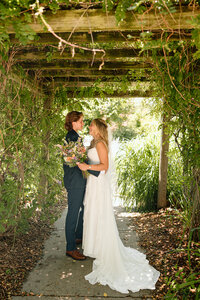 couple laughs together during photoshoot in missouri