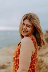 San Diego Senior Photo Shoot at Sunset cliffs point loma PLNU ocean beach graduation candid photography