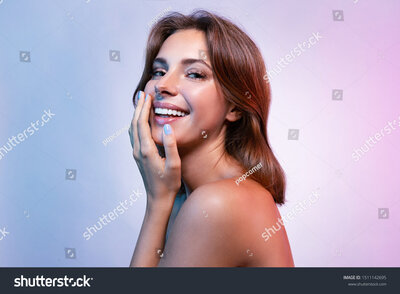 stock-photo-portrait-of-smiling-woman-looking-at-camera-with-happiness-beautiful-lady-touching-face-with-hand-1511142695