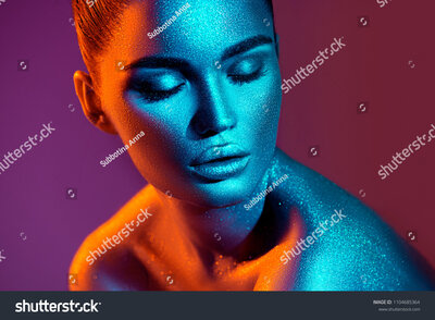 stock-photo-high-fashion-model-girl-in-colorful-bright-sparkles-and-neon-lights-posing-in-studio-portrait-of-1104685364