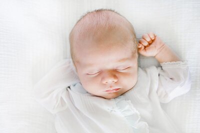 fallback shared on Invalid Date | newborn photo of baby on a white backdrop