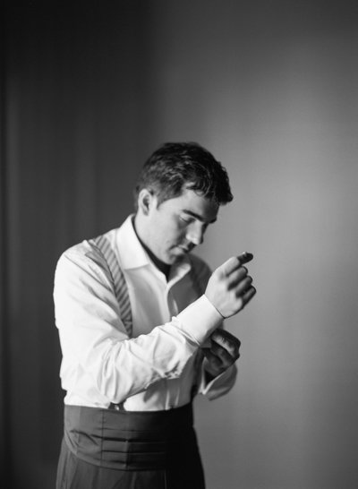 fallback shared on Invalid Date | bay area photographers captures groom buttoning her shirt