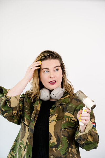 Financial-Feminist-Podcast-Host-camo-jacket-Tori-Dunlap-3 (1)