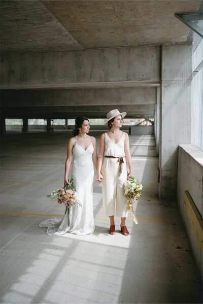 couple-holding-hands-and-flowers