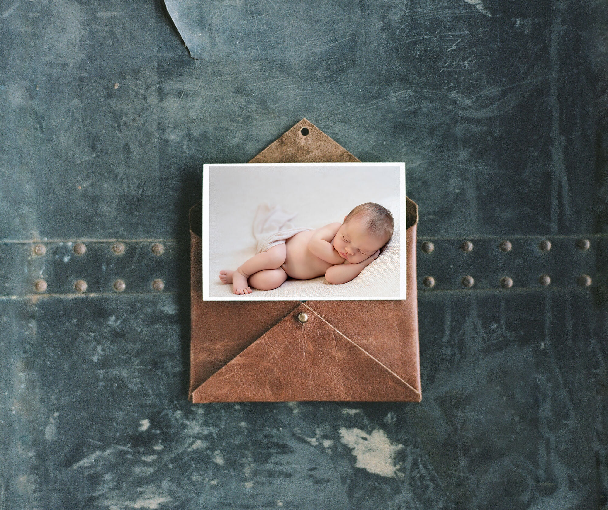 Fremantle Newborn Photography baby sidelying print on leather envelope | gracie and the wren