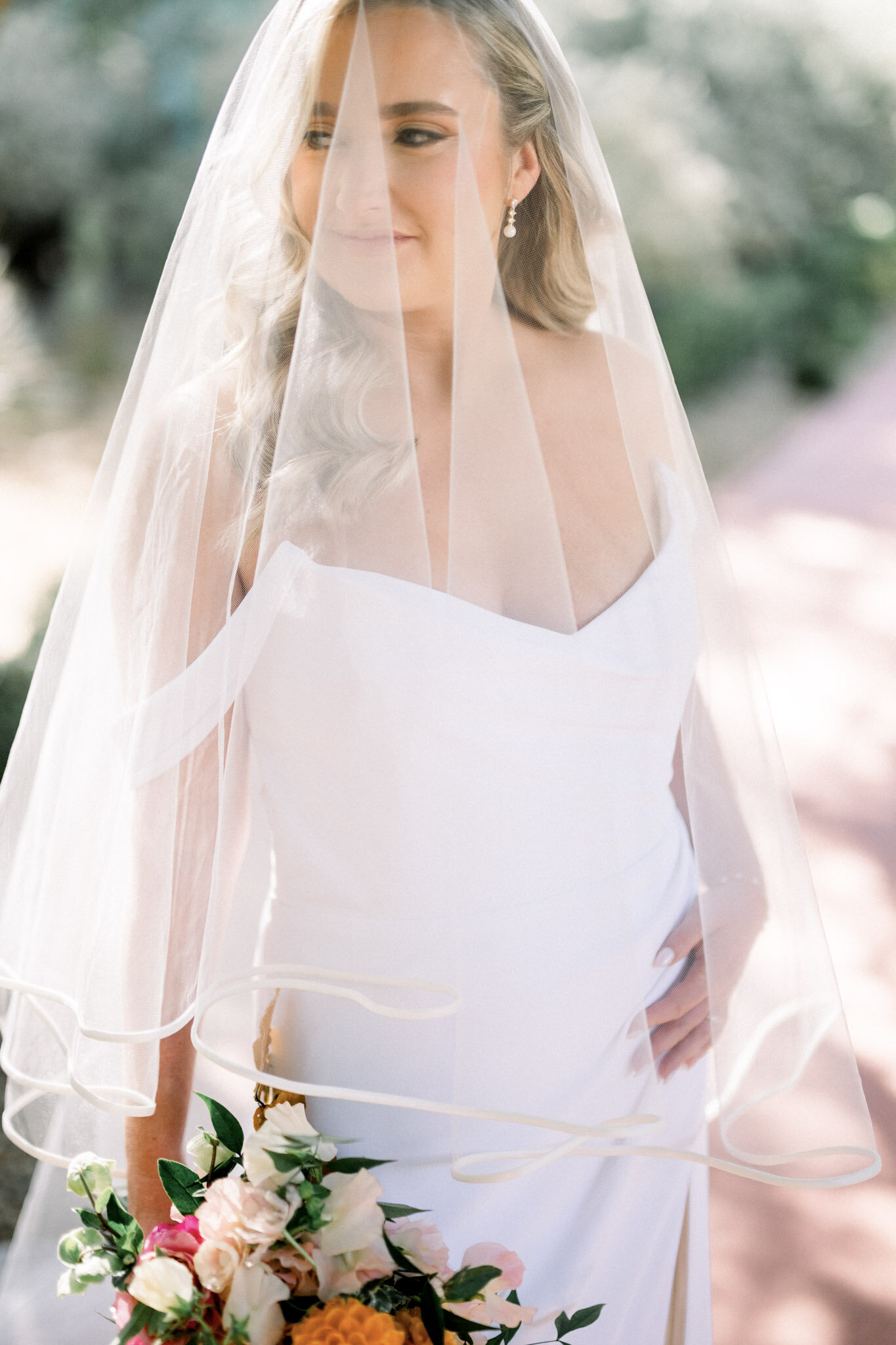 Close up of bride with veil on near Scottsdale, AZ. 