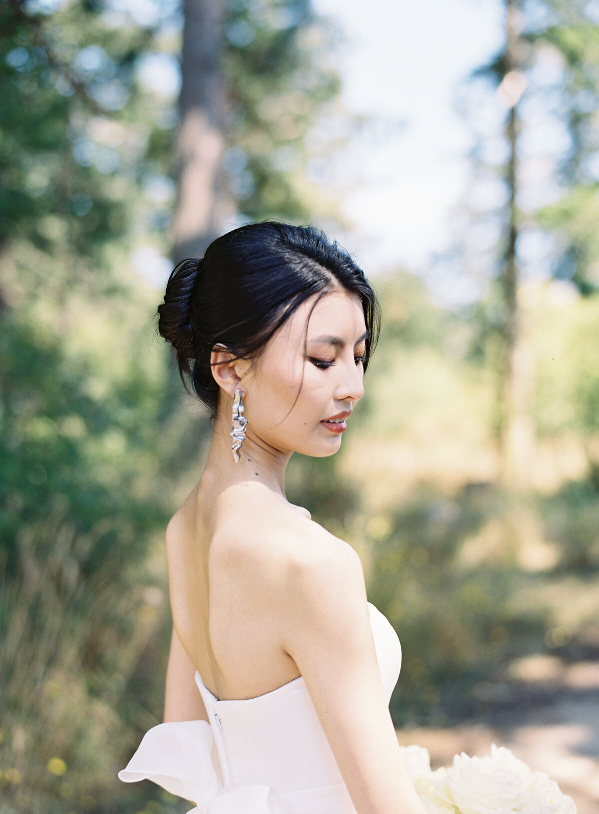 film portrait of beautiful asian bride outdoors