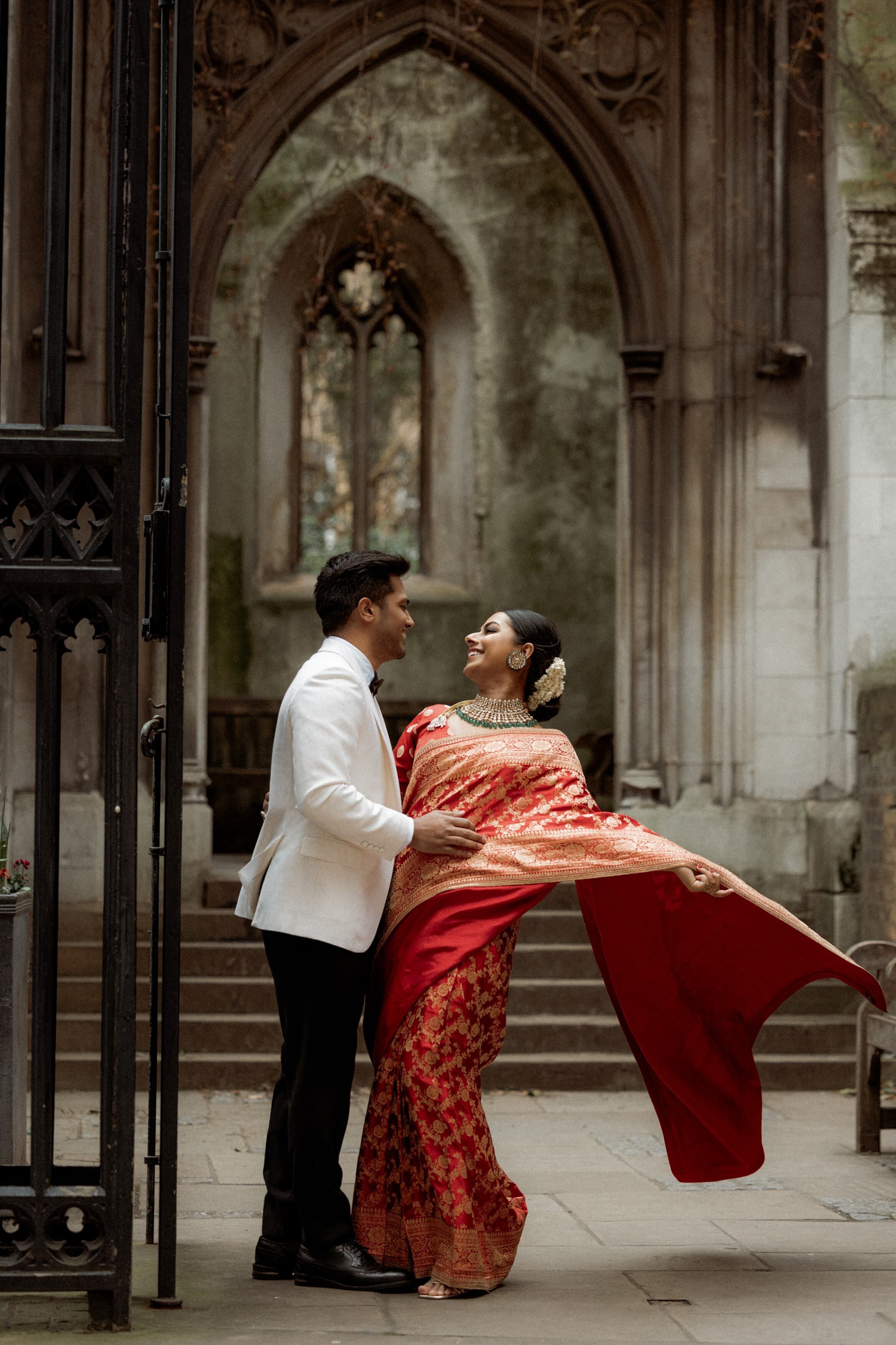 lovely-photo-of-indian-couple-cuddling-posing-for-London-elopement-photographer-st-dunstan-in-the-east-church-0348-Hadi Photography