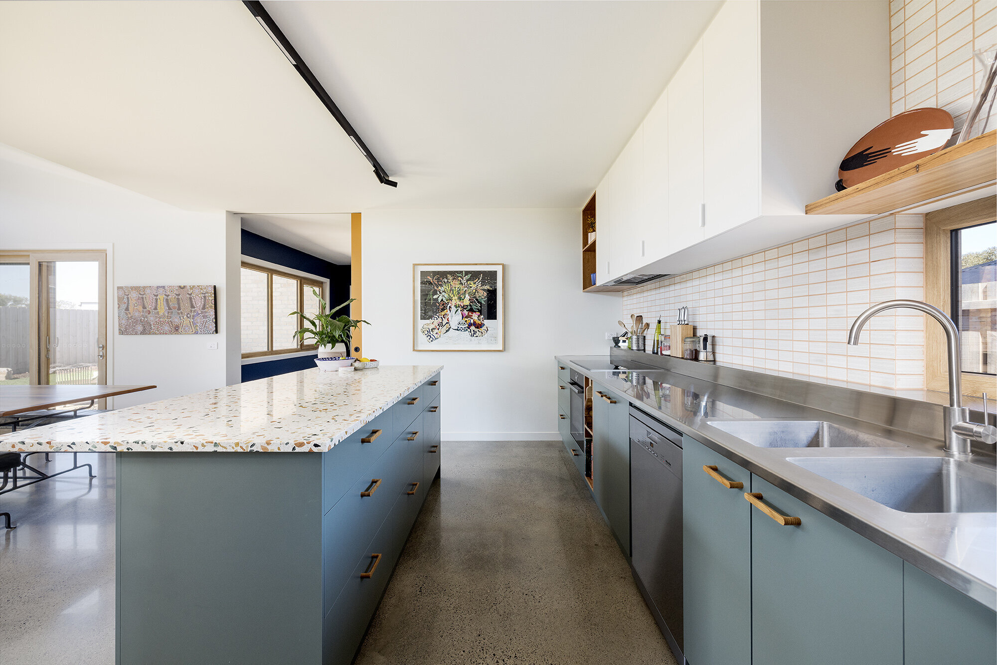 sustainable home modern country design kitchen colour blue wooden handles