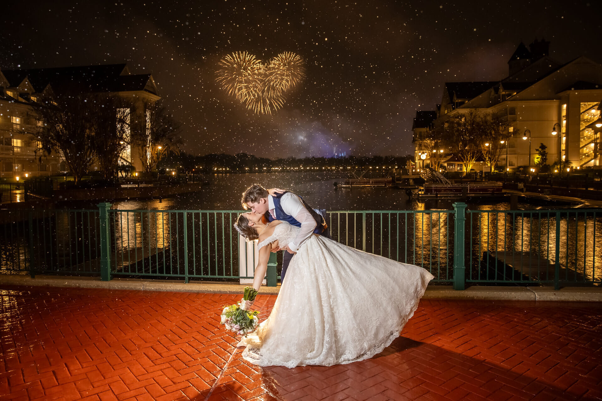 Destination-Wedding-Photographer-Disney-Rain-Firework-Dip-Kiss