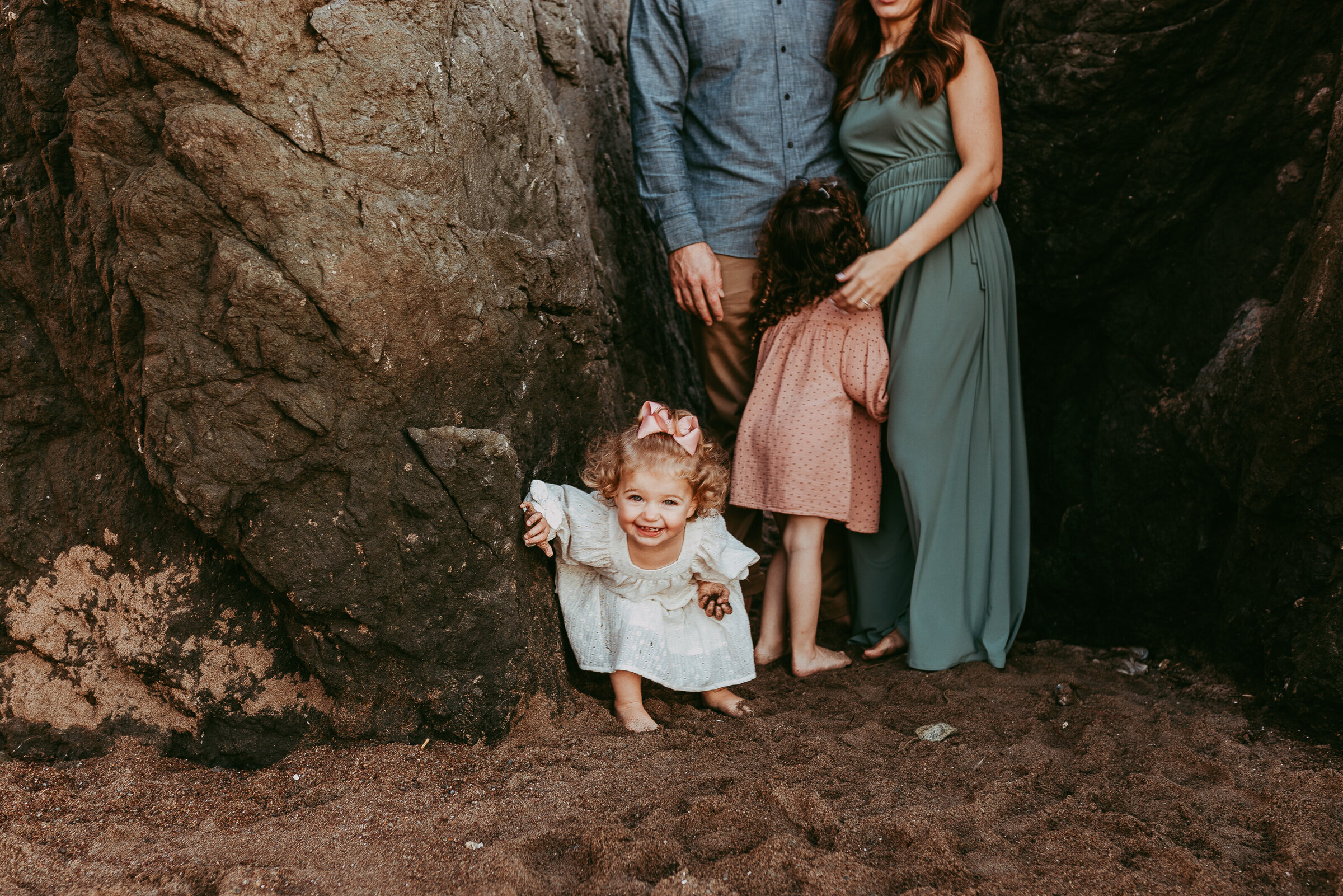 Family together on Rodeo Beach