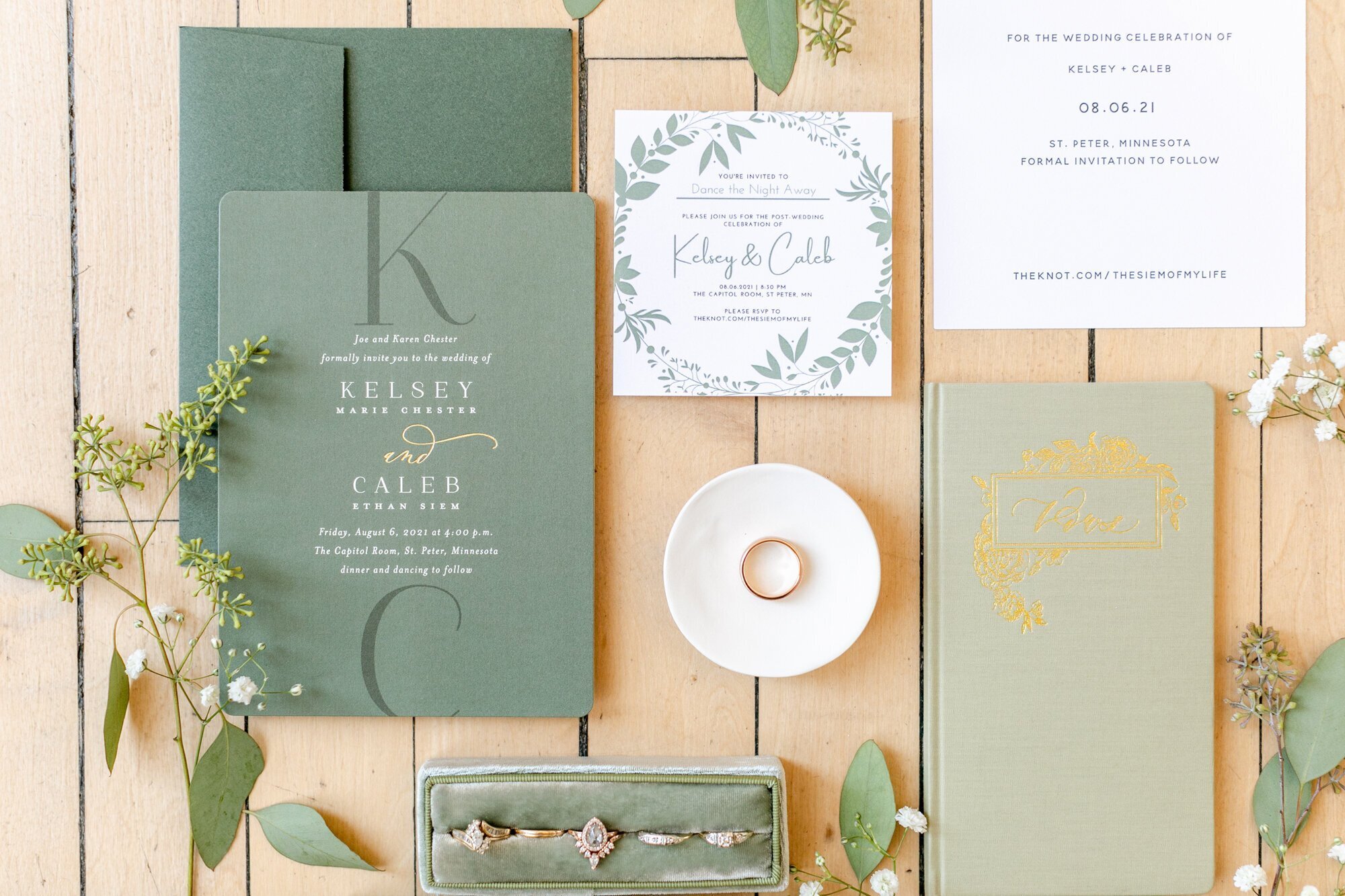 Wedding details including invites, rings, and jewelry, taken by  wedding photographers minneapolis