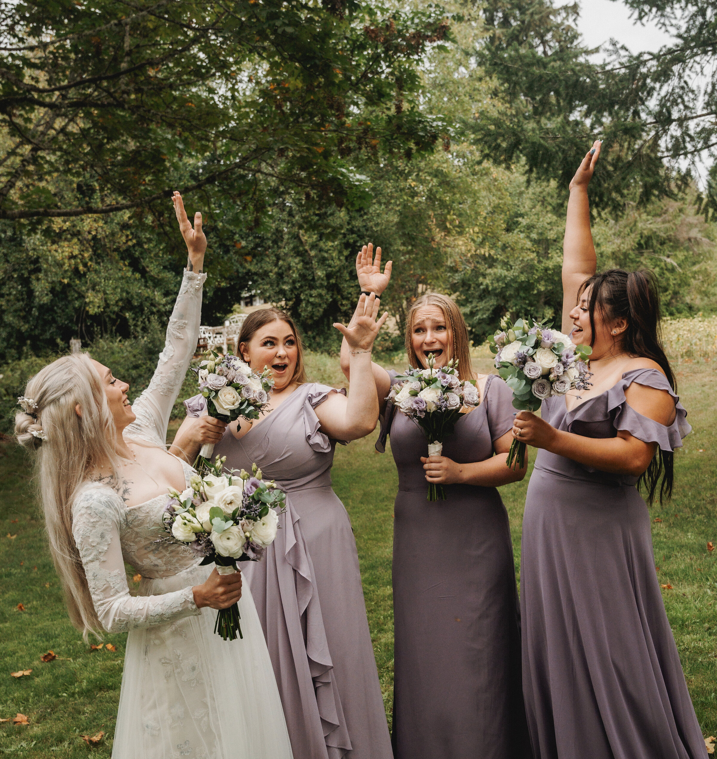 bridal party bridesmaids all cheering for bride 