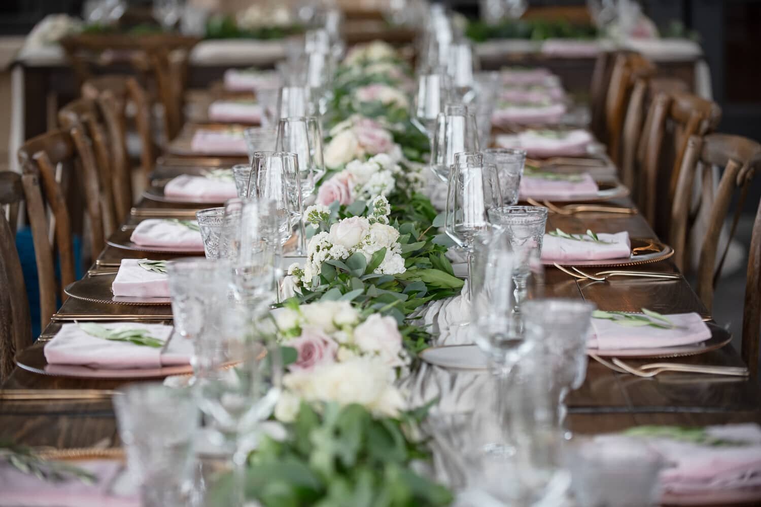 long farm table at an outdoor wedding in california