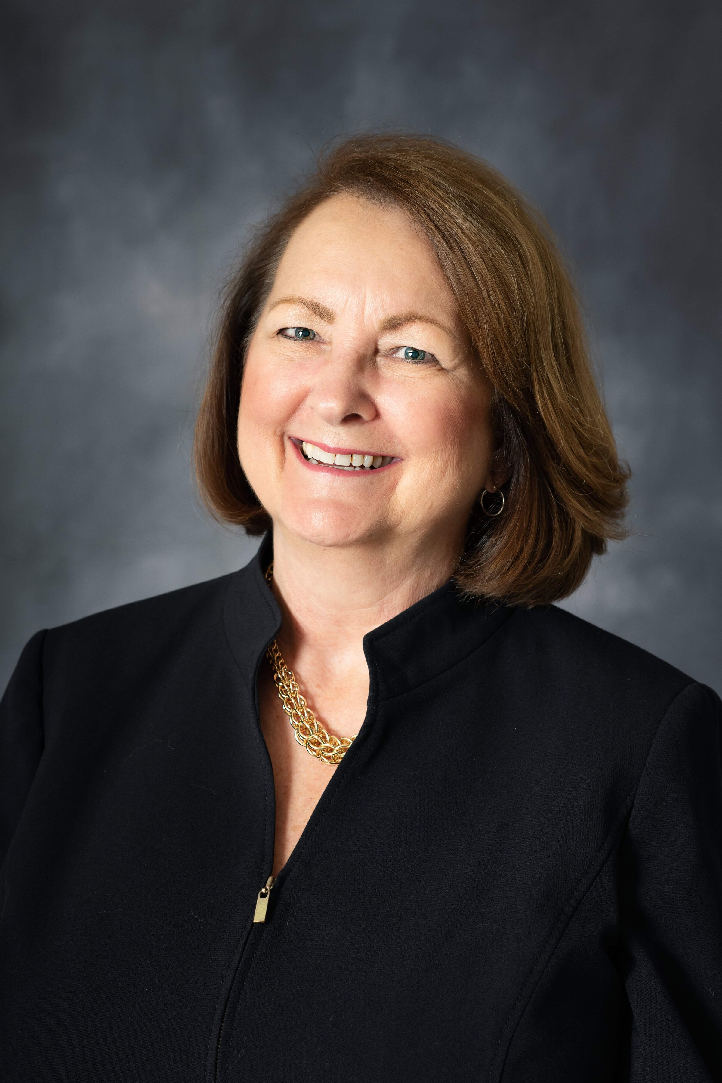 Executive branding headshot with neutral backdrop in Virginia studio