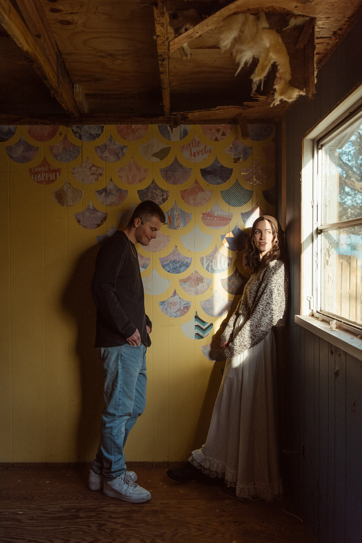 Couples in home documentary engagement session