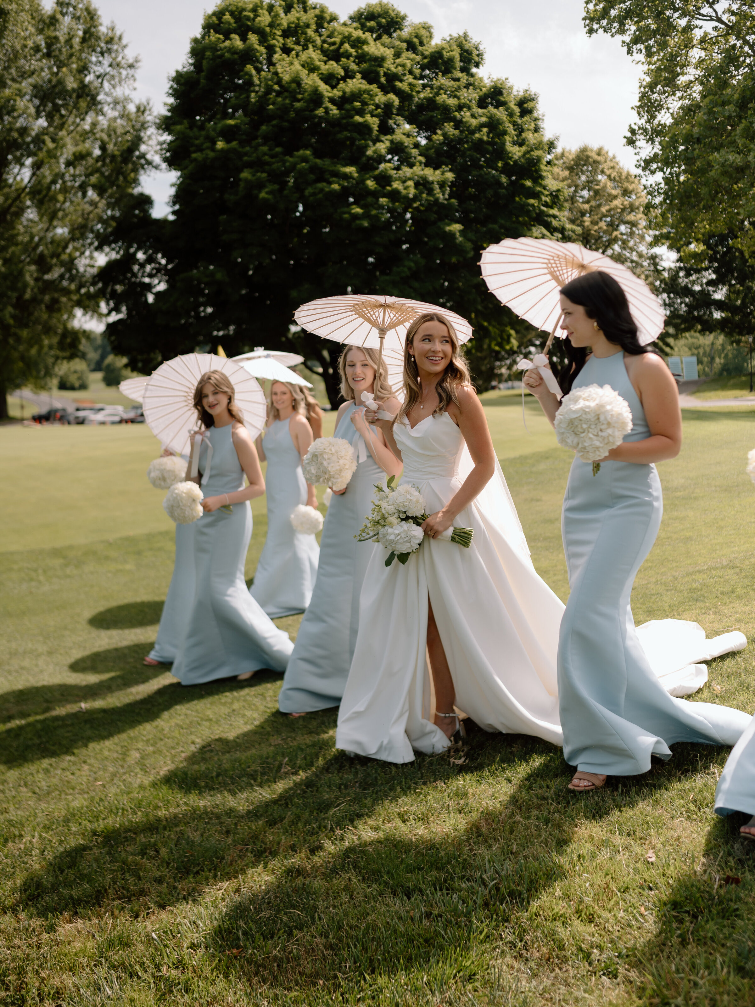 a bride and her bridesmaids walking in jacksonville, fl