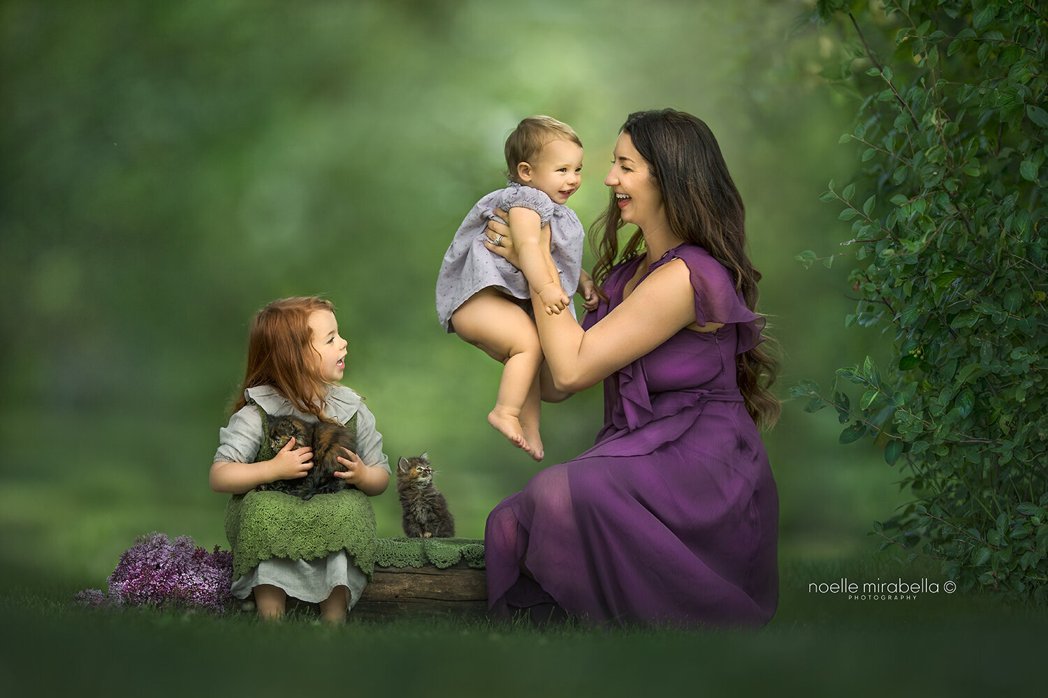 Mom playing with her two girls outside. Fine art outdoor photos.