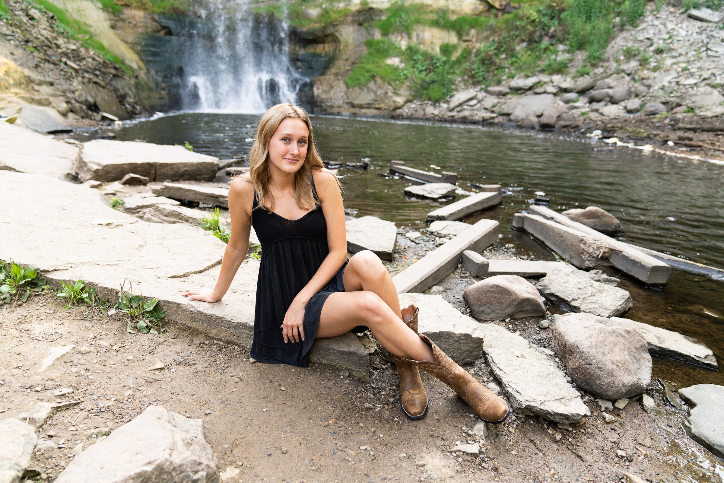 Senior picture of a girl by Minnehaha Falls in Minneapolis, Minnesota