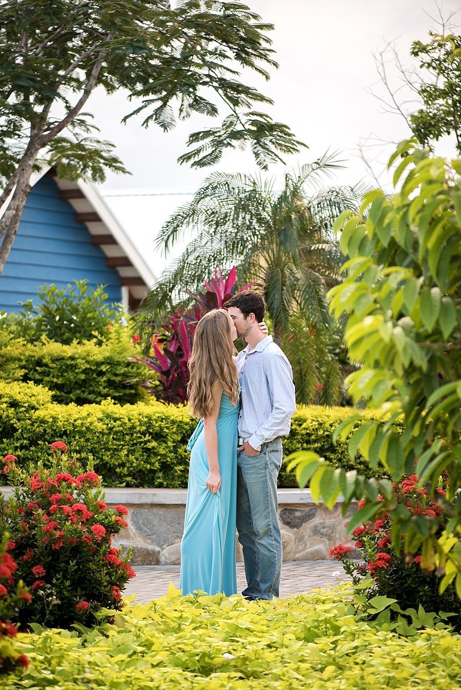 Couple surrounded by tropical plants