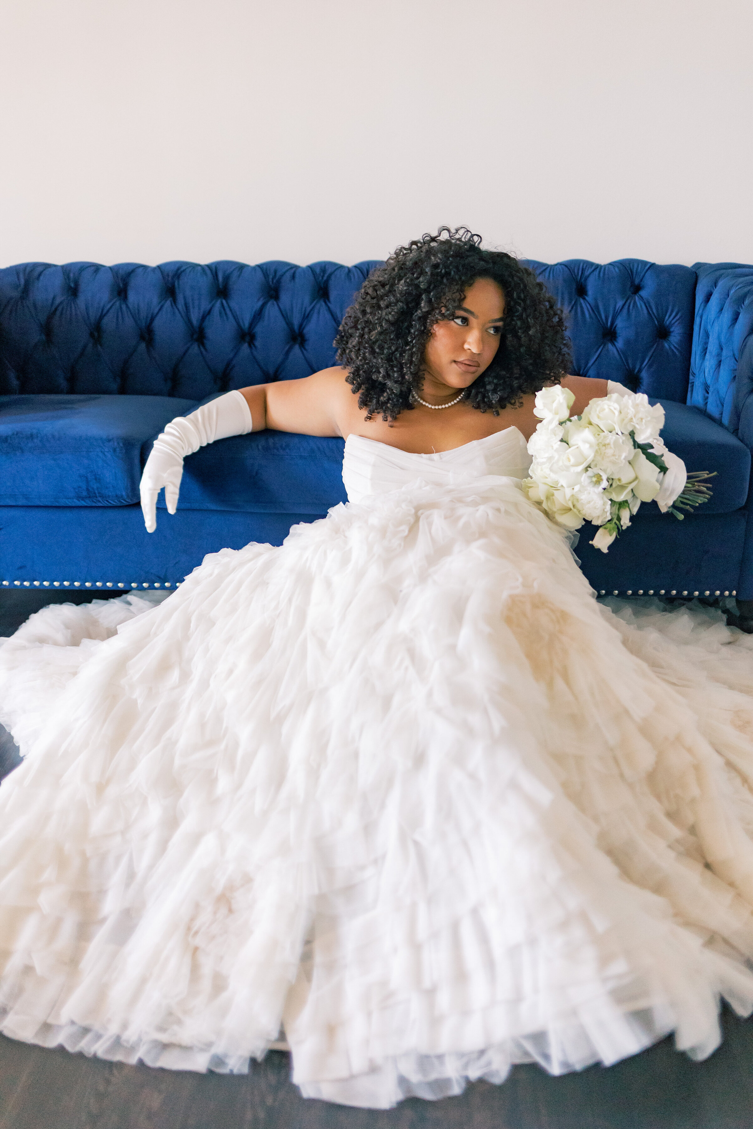 bride-sitting-blue-couch