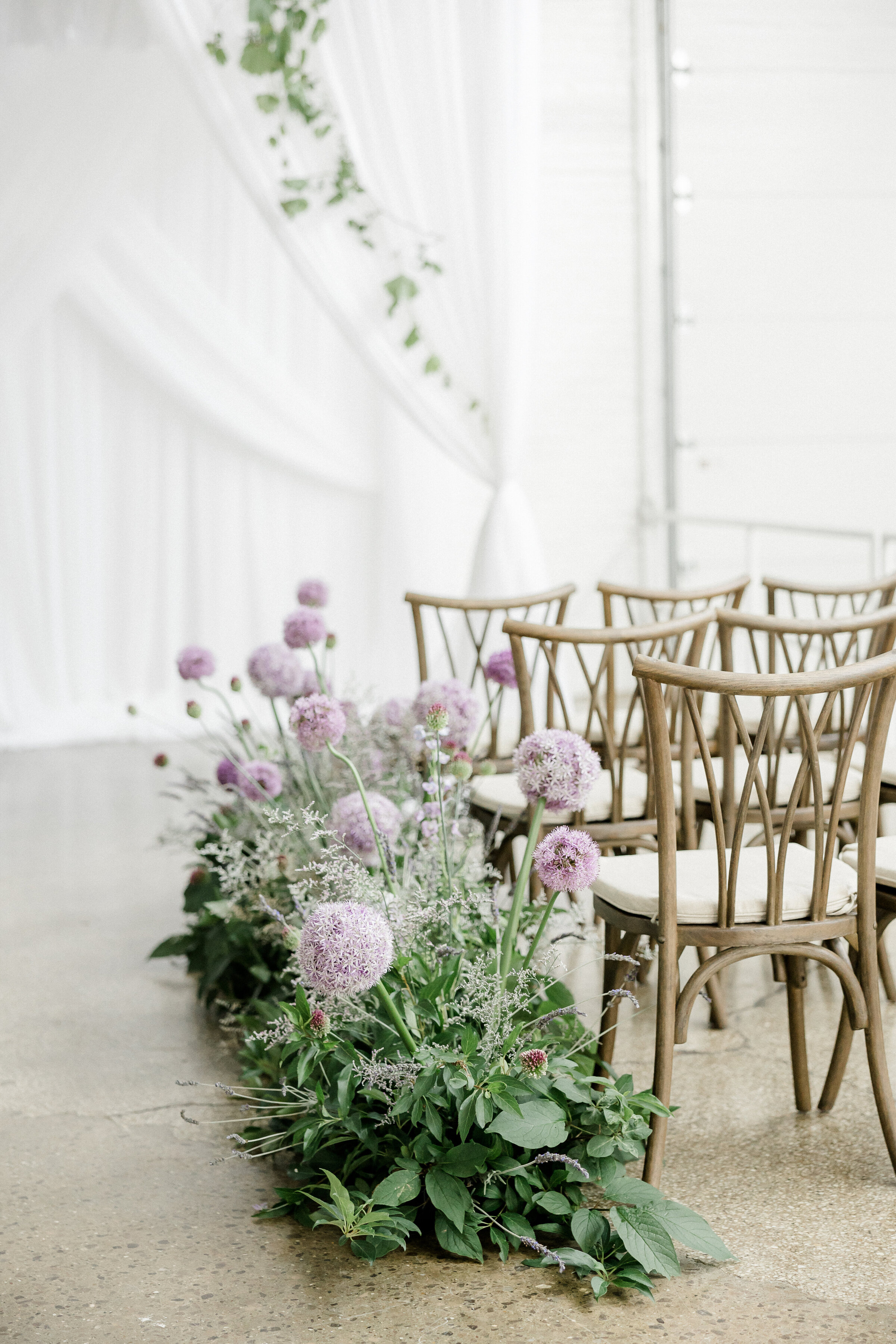flowers in ceremony aisle