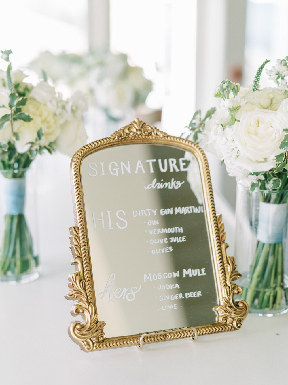 custom bar menu at wedding on golden mirror diy