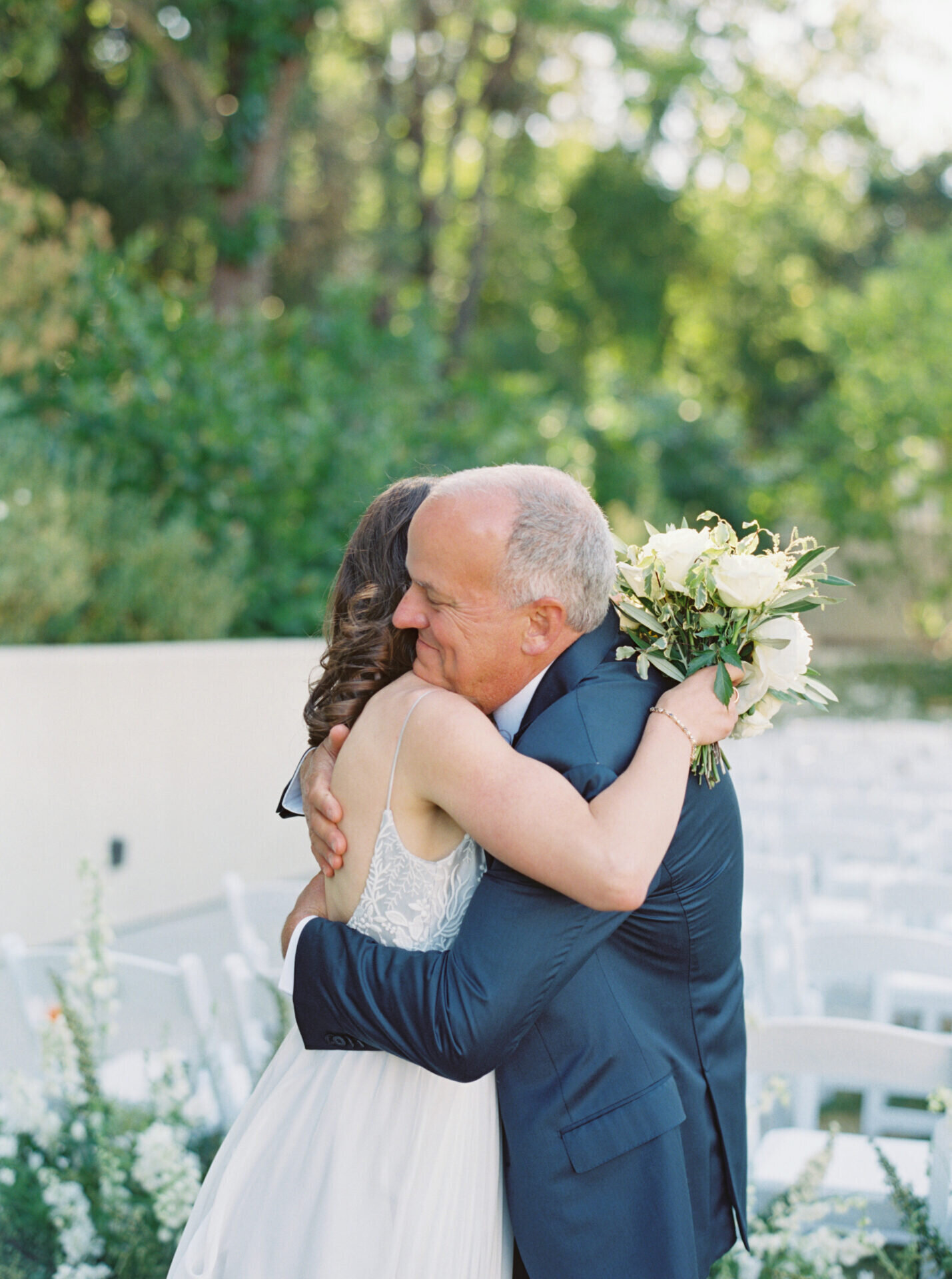 bride hugging her dad
