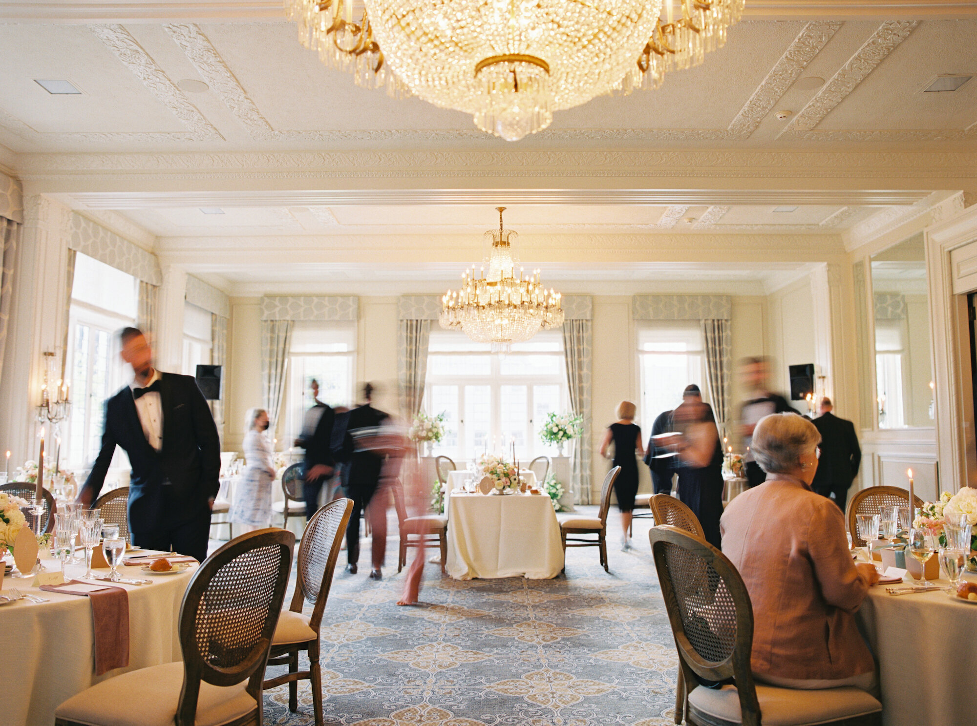 wide slow shutter photo of the heritage ballroom at the rainier club in seattle