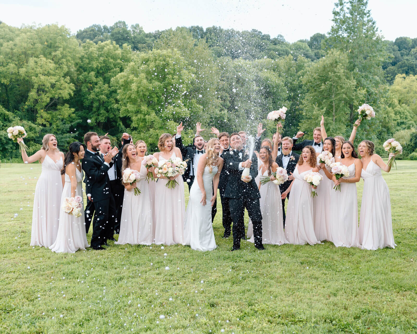 bridal party cheering taken by lexington kentucky wedding photographers