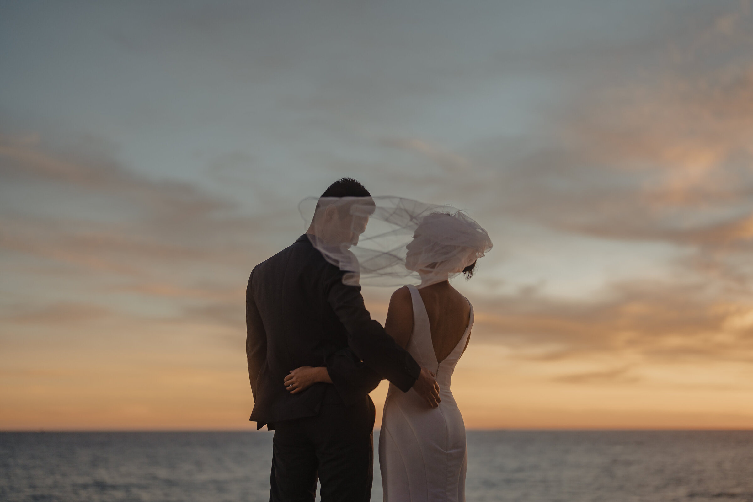 Breathtaking sunset beach vows in Los Angeles, a perfect romantic wedding moment