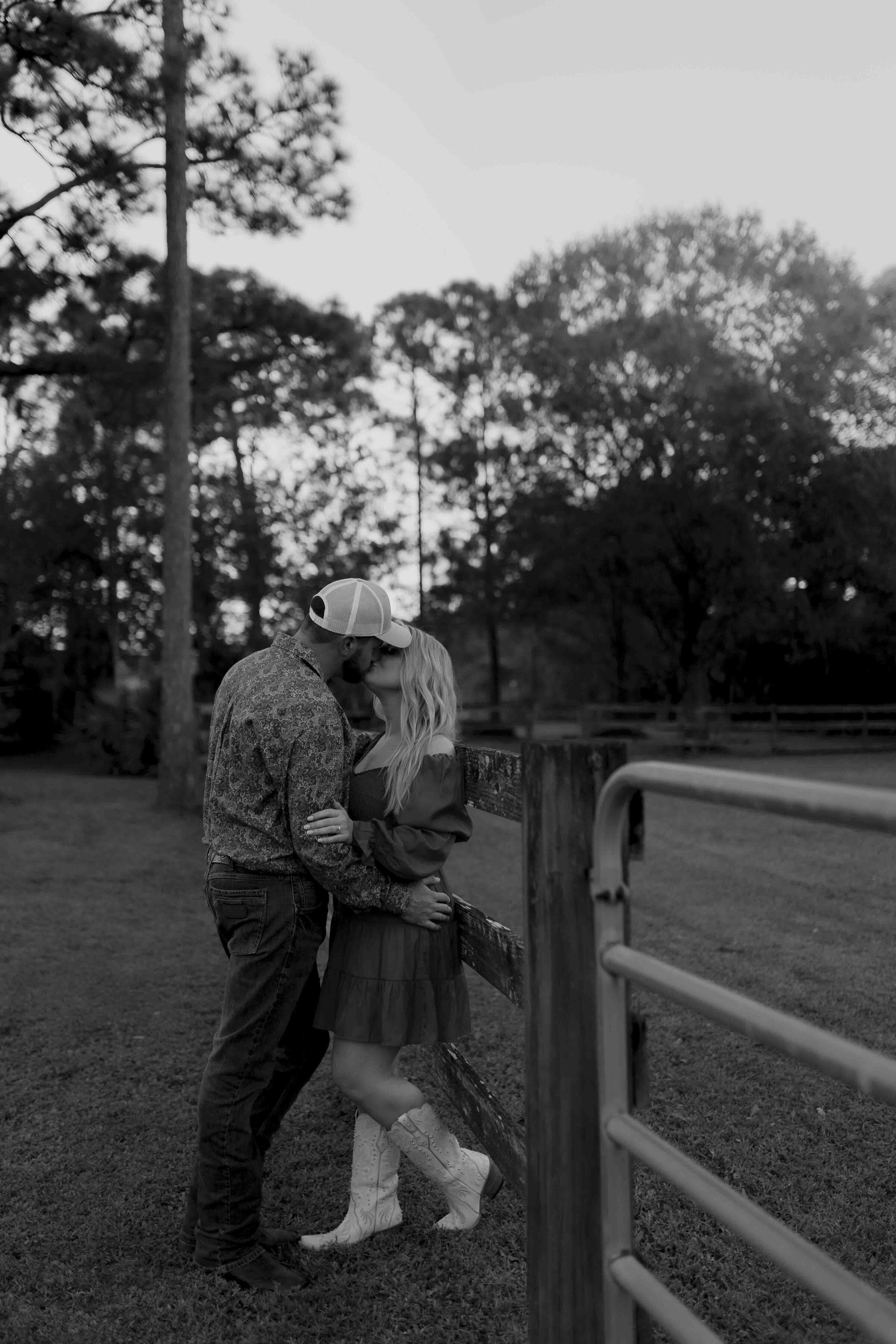 Couple kissing in a field