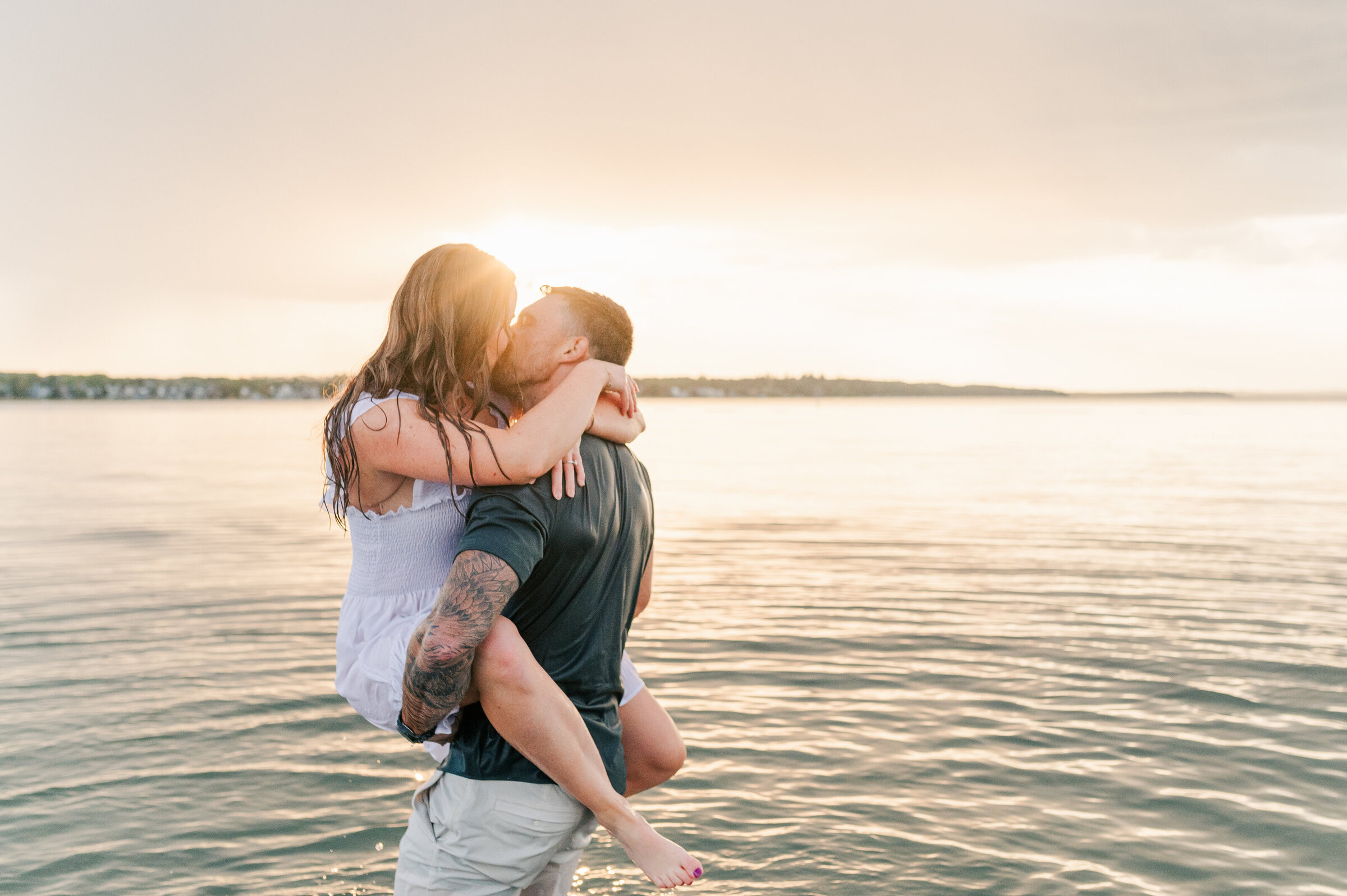 Sunset Beach Engagement Session in Sylvan Lake Alberta