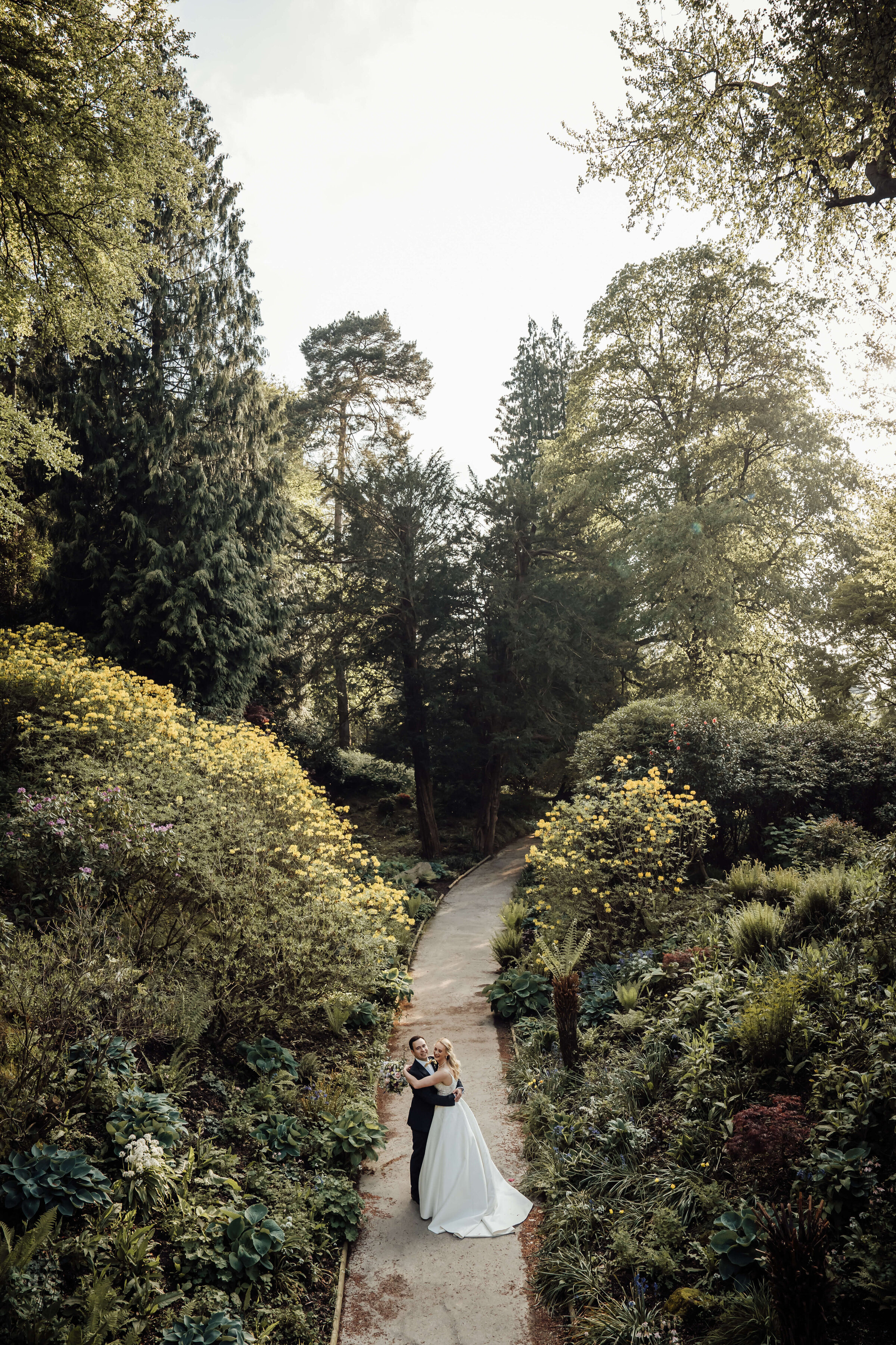 hever-castle-wedding-couple-garden-path