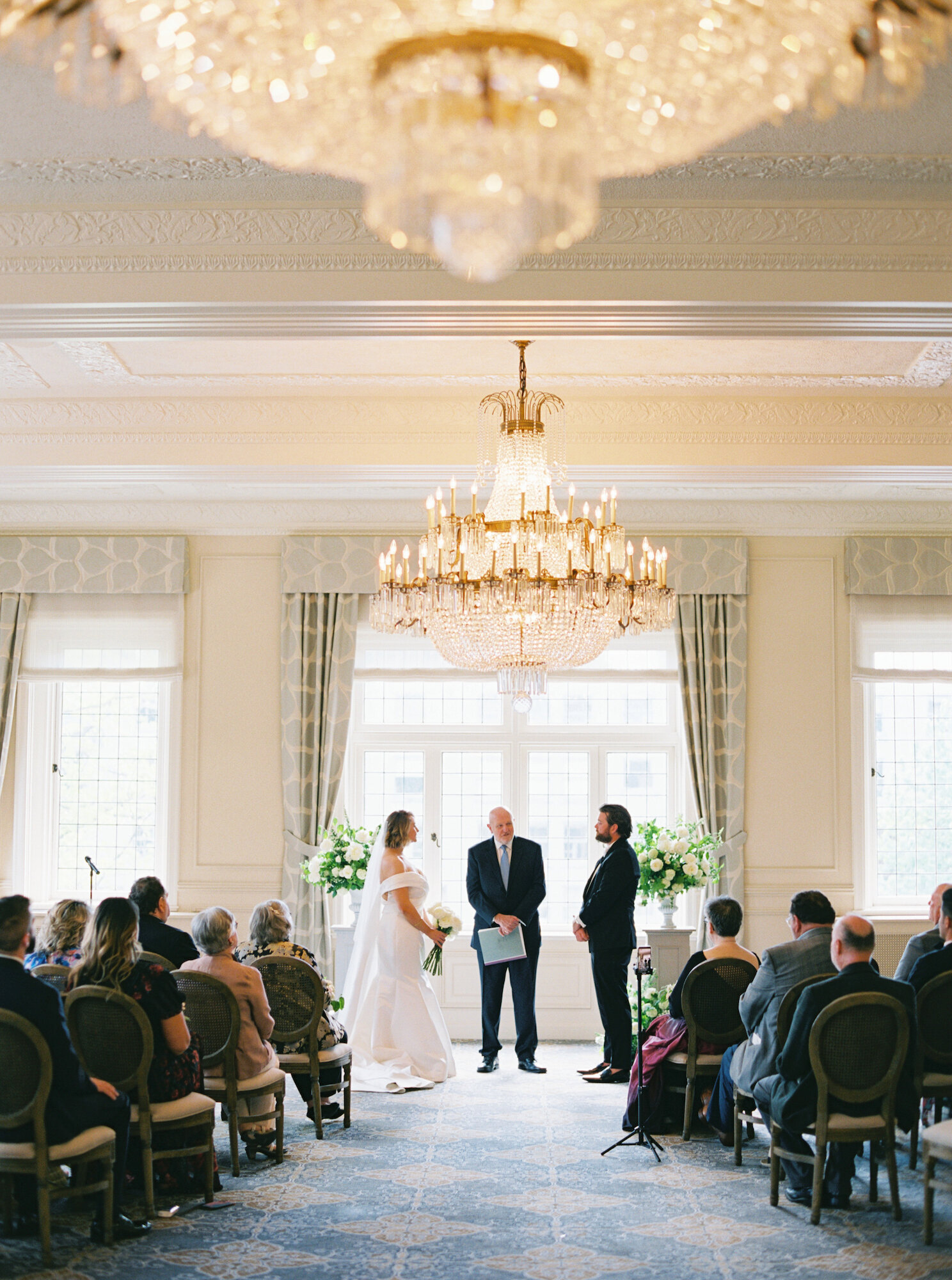 historic seattle wedding venue the rainier club ceremony in the heritage room film photography