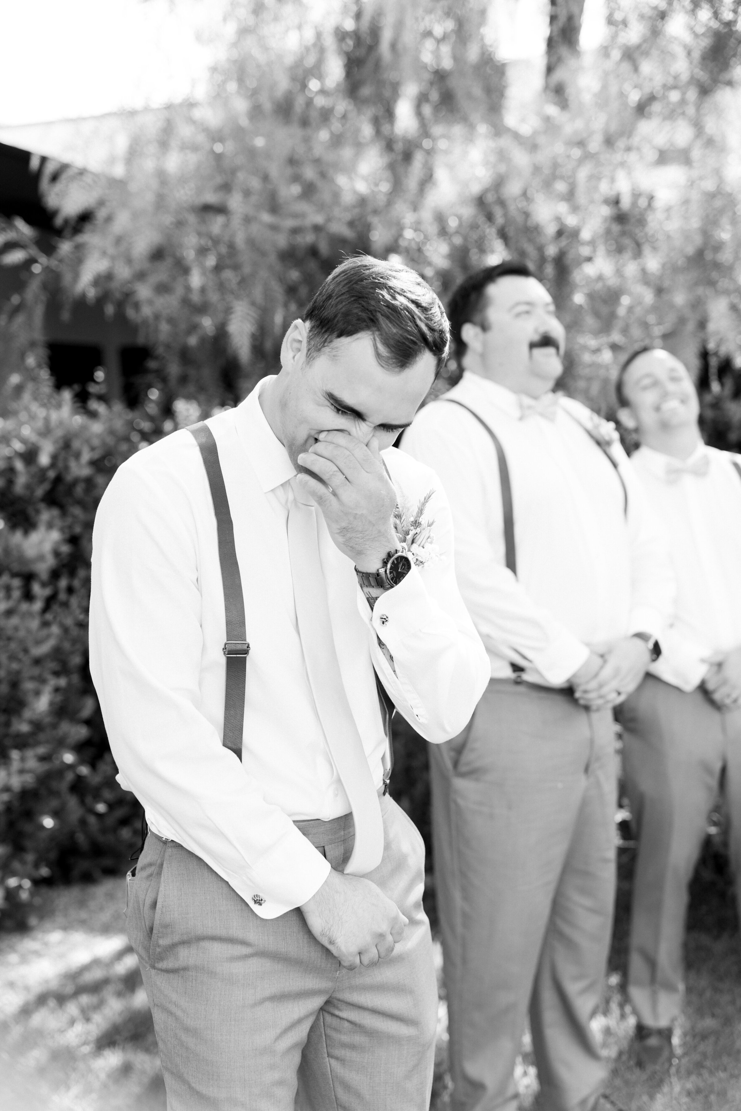 A candid moment of a groom, crying on his wedding day in Santa Barbara, California, as the Bride walked up the aisle, and he couldn't help but become emotional.